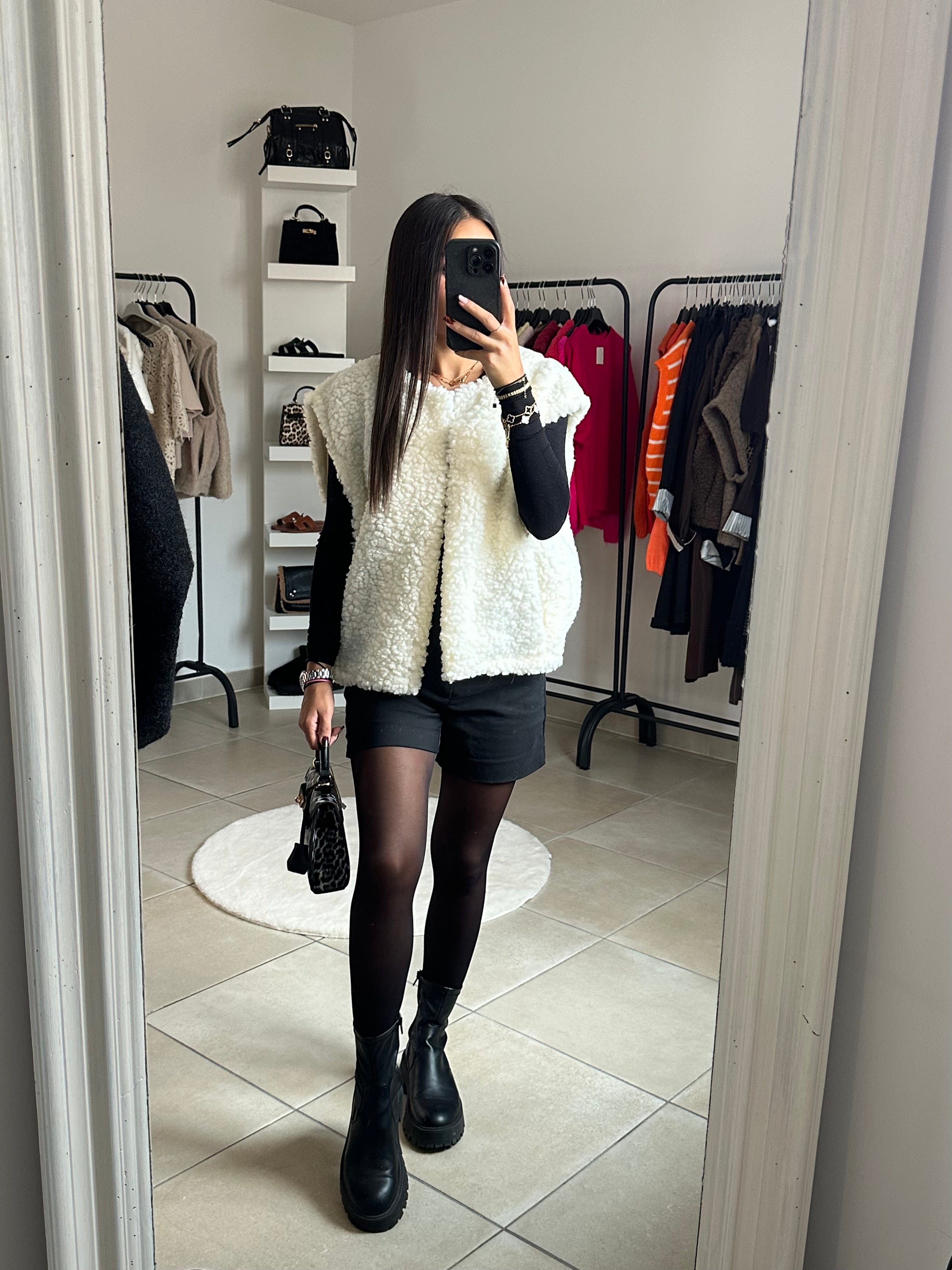Veste sans manches moumoute
