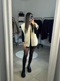 Veste sans manches moumoute